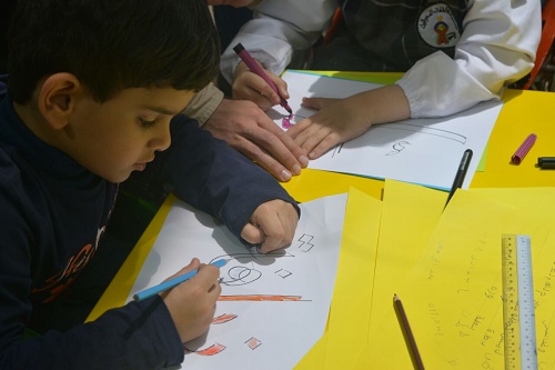 الأطفال المعوقين بعسير يختتمون ورشة الخط العربي بأكثر من 35 مخطوطة